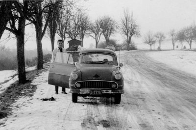 George Grant in front of Jean Davis's Opel